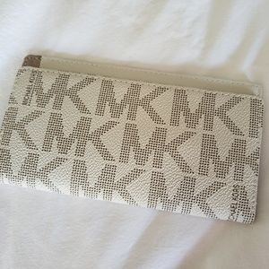 Michael Kors check book